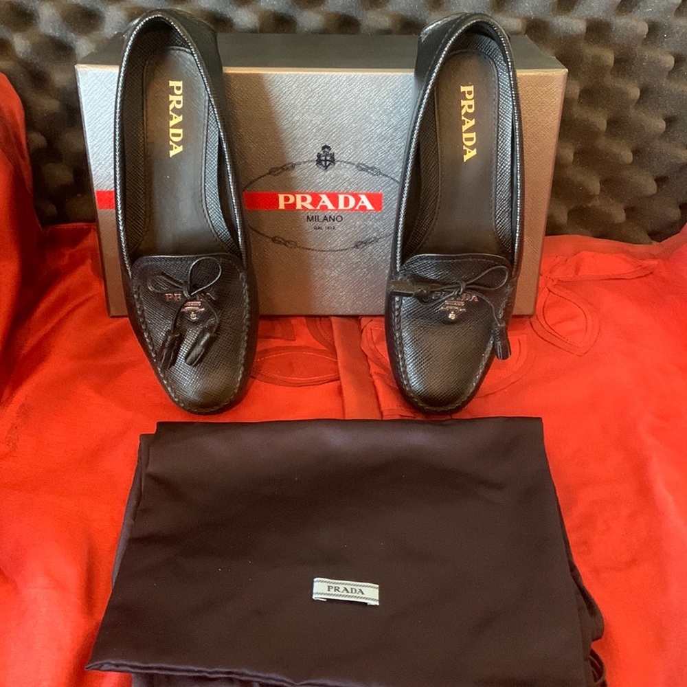 Prada woman’s black driving moc, size 5.